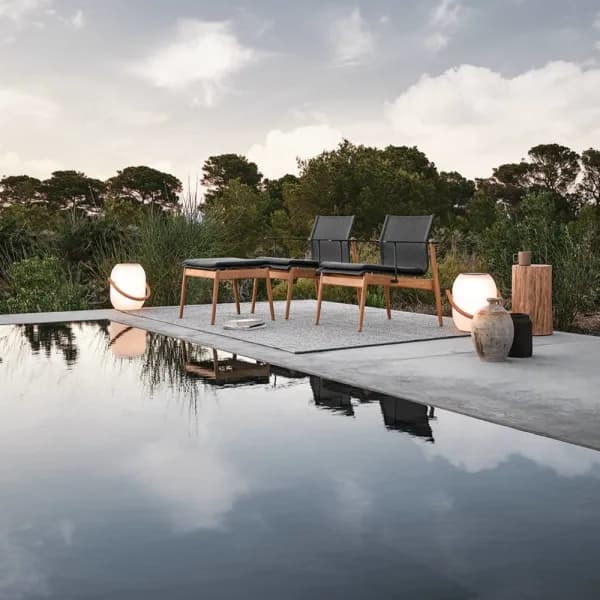 Gloster Sway Lounge Chair & Ottoman | Block Side Table | Ambient Cocoon Outdoor Light