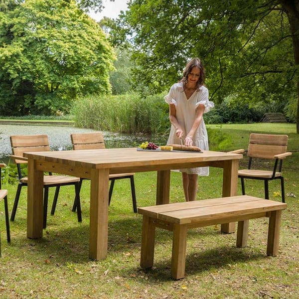 Barlow Tyrie Titan Stacking Rustic Teak Armchairs and 51" Dining Bench with 71" Dining Table