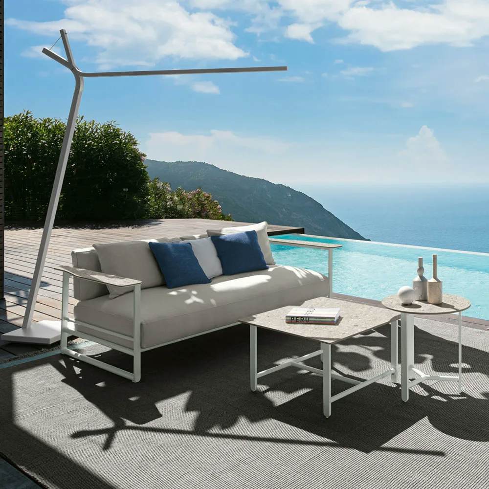 refined beauty: the riviera 2-seater sofa, living armchair, and coffee tables are right at home in the most stunning locations
