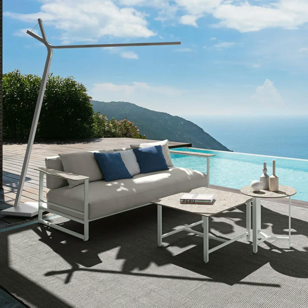 refined beauty: the riviera 2-seater sofa, living armchair, and coffee tables are right at home in the most stunning locations