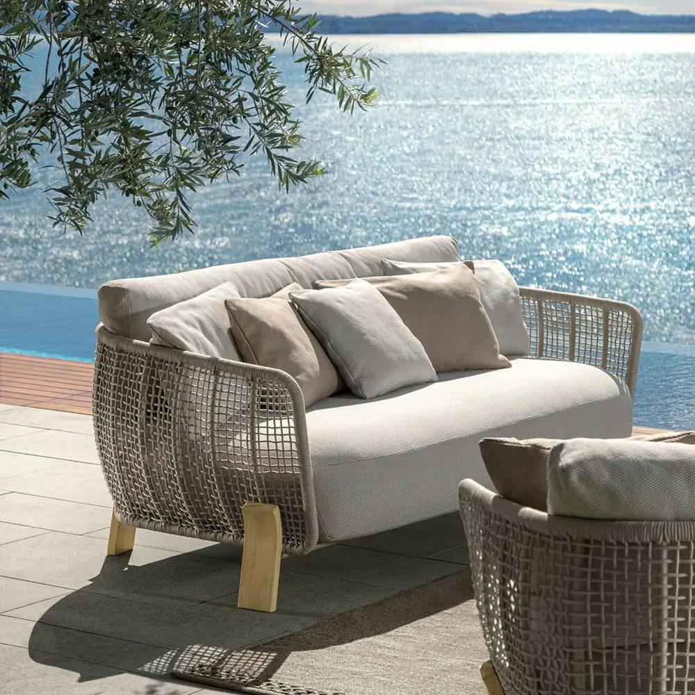 designer details: thoughtful touches like curved wooden feet and nautical woven ropes make the argo sofa loveseat a stand-out piece