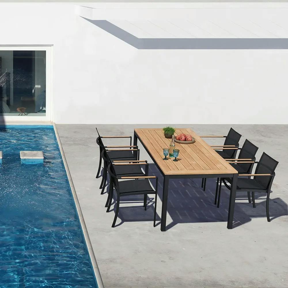 poolside dining: o-zon dining armchairs and sunlounger are a perfect match for the royal bota taboela teak table