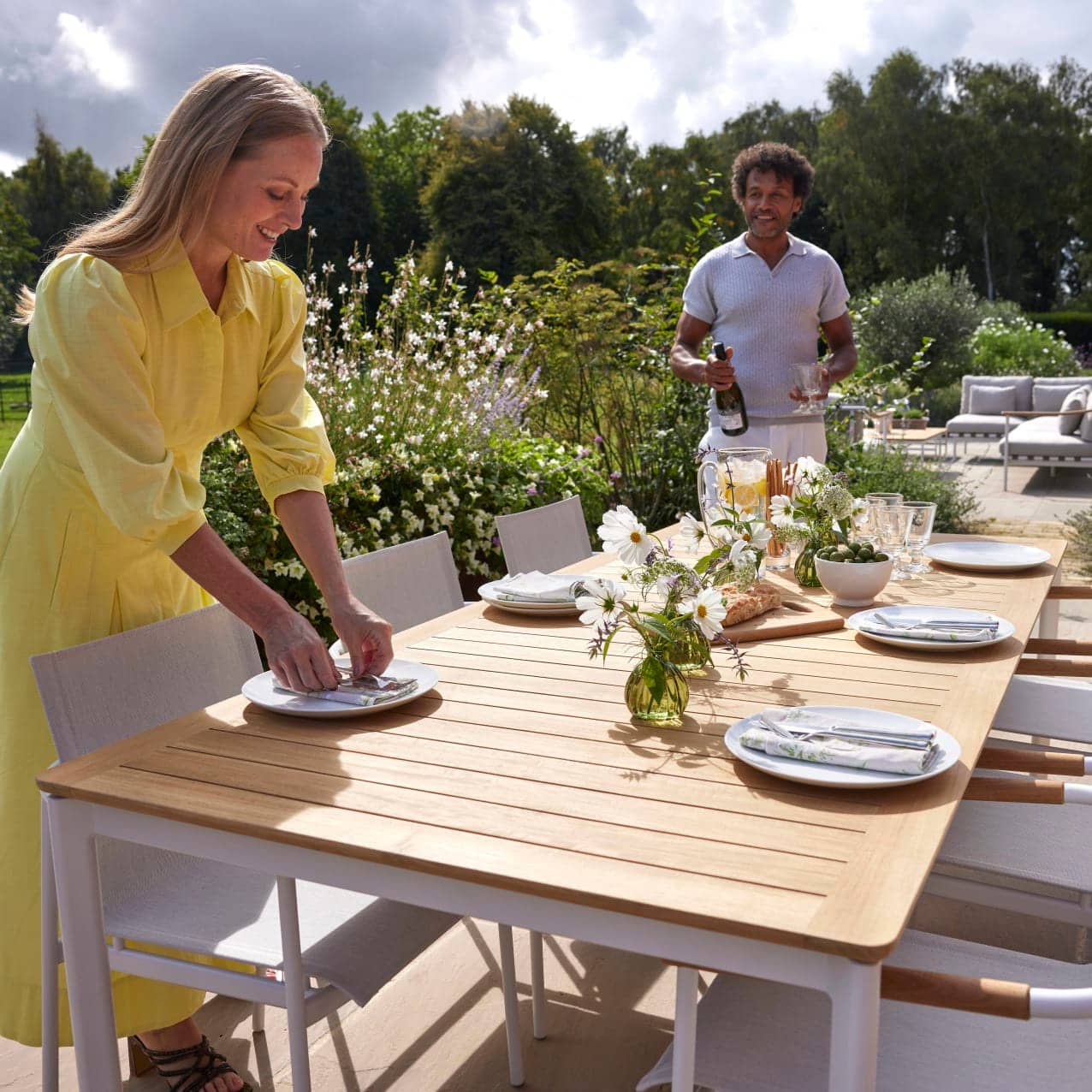 Barlow Tyrie Around 85" Dining Table and Dining Armchair