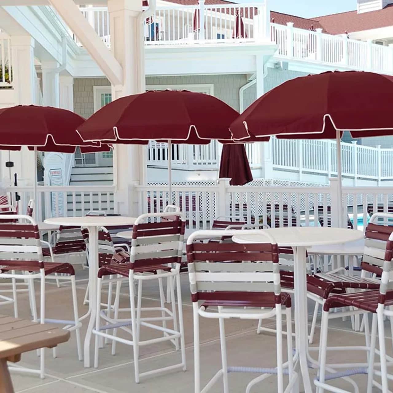 color coordinated: catalina manual lift no tilt w/ valance and vent in burgundy and white pole finish matching the dining chairs