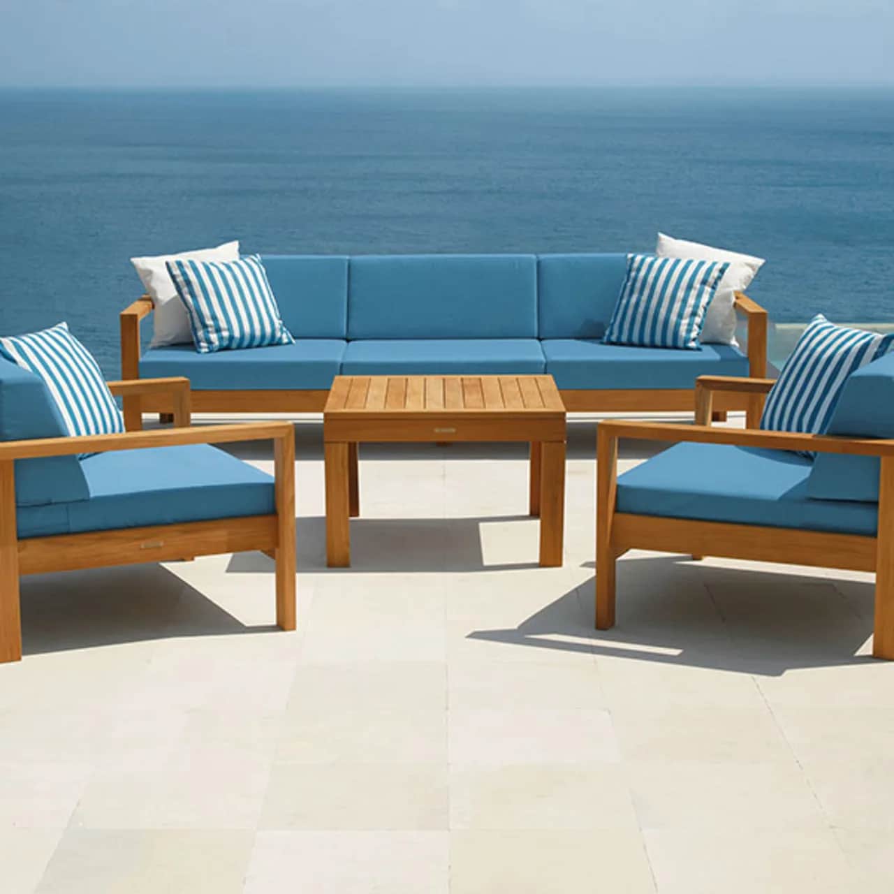 linear 3-seater settee with two linear armchairs surrounding the linear 30" square side table