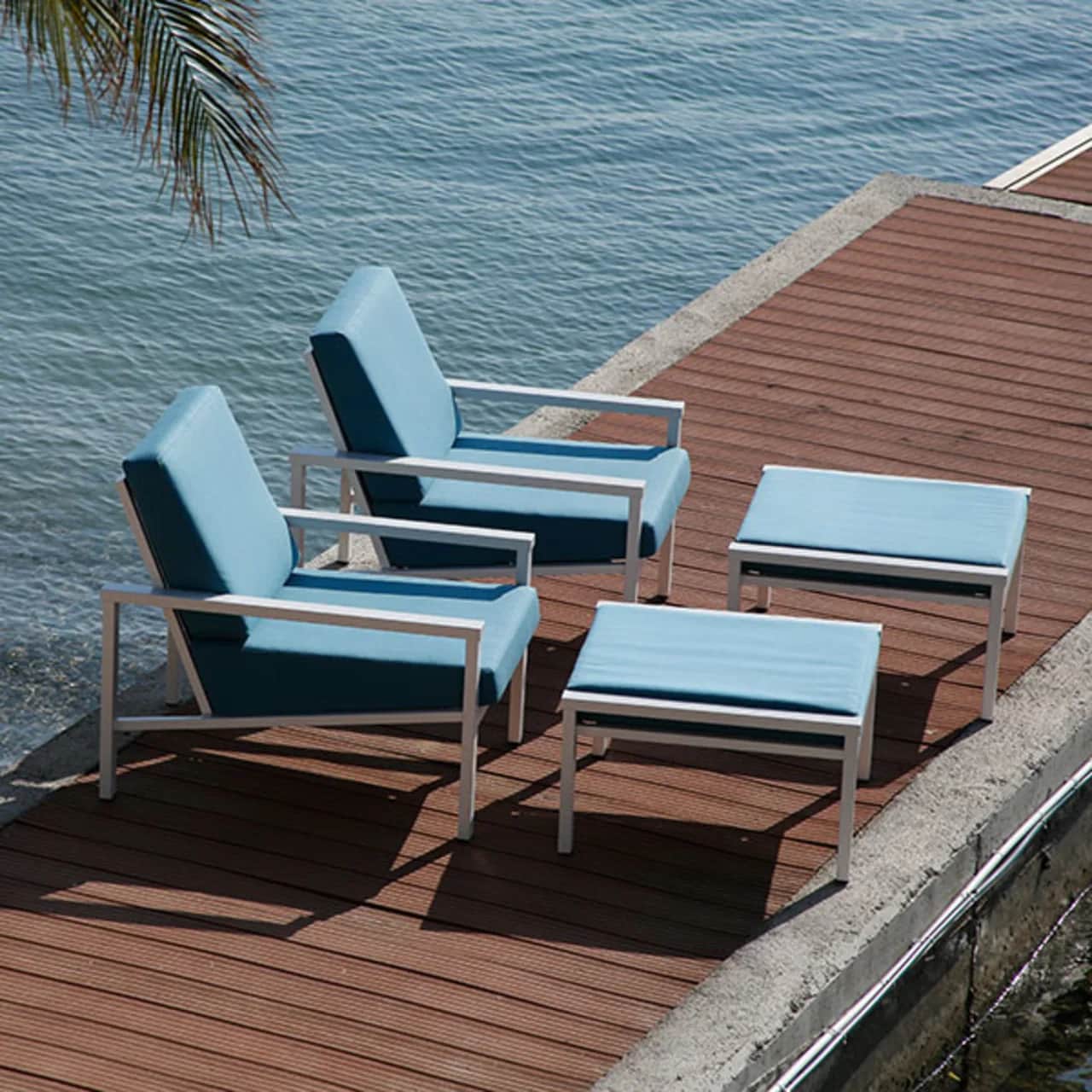 facing the sun while sitting comfortable: two armchairs with ottoman in arctic white