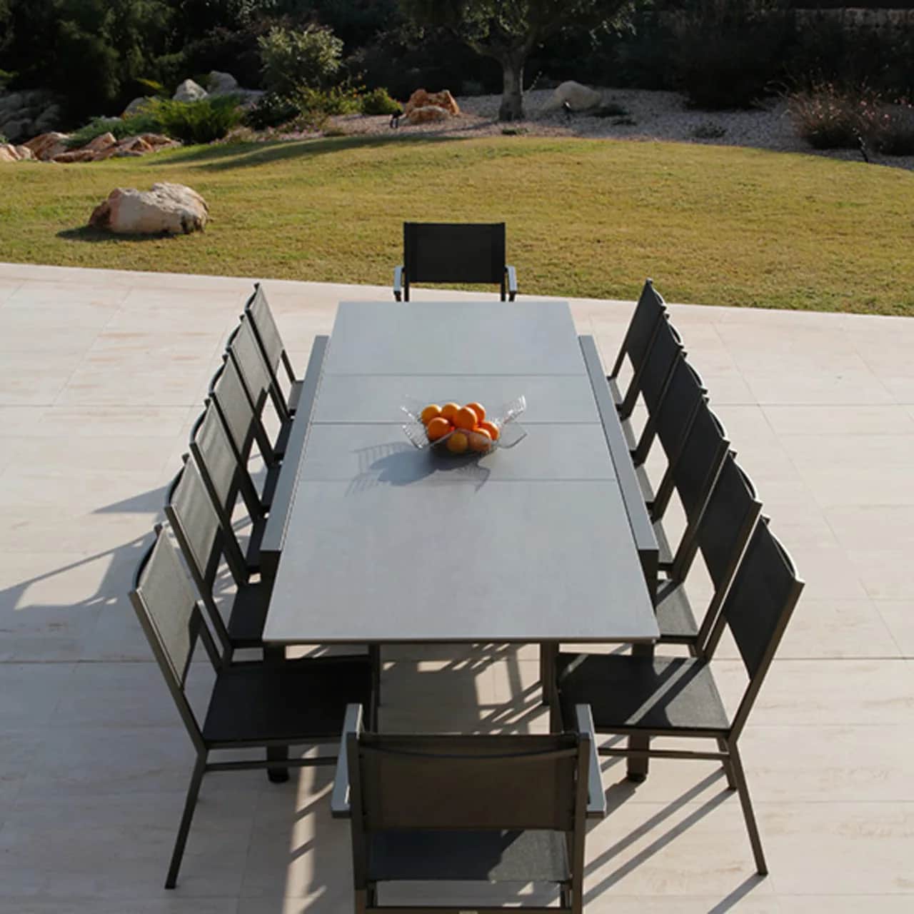 Barlow Tyrie Equinox Extending Table (Finishes: Graphite/ Carbon/ Dusk) with Equinox Armchairs and Side Chairs