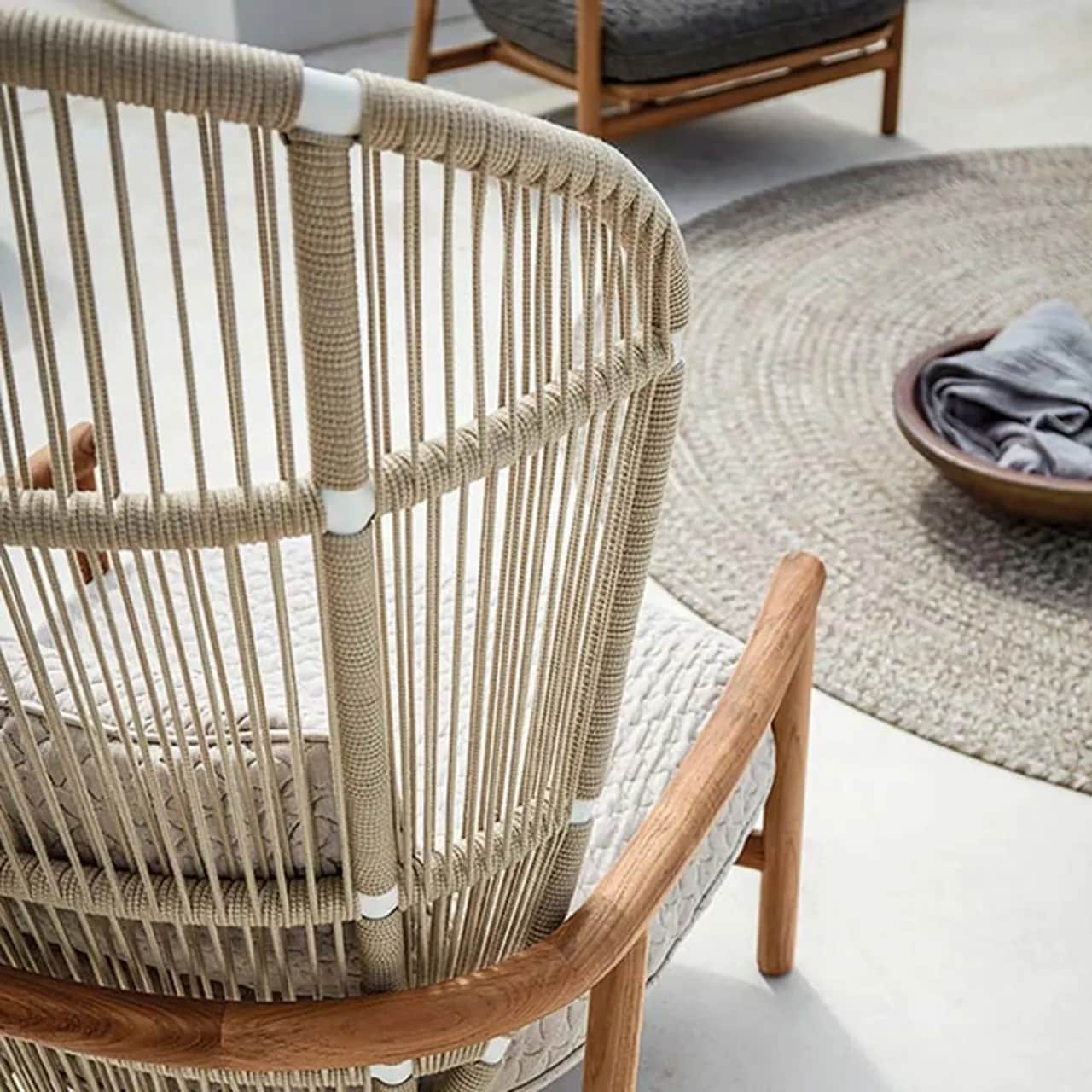 mirroring nature: fern design accomplished by intricately woven outdoor rope over powder-coated aluminum frame