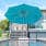 Frankford 13' octagonal Eclipse Cantilever Umbrella in Turquoise Canvas Fabric