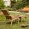 garden retreat: monterey teak deep-seating armchair, teak ottoman and teak 3-seater settee with optional cushions
