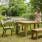 Barlow Tyrie Titan Stacking Rustic Teak Armchairs and 51" Dining Bench with 71" Dining Table