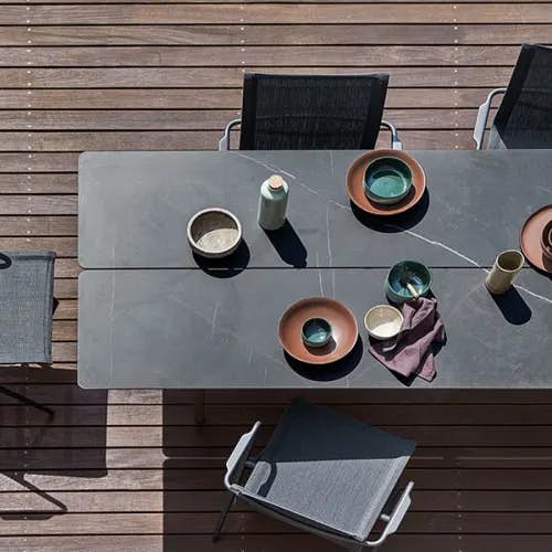 split dining table with ceramic top in nero