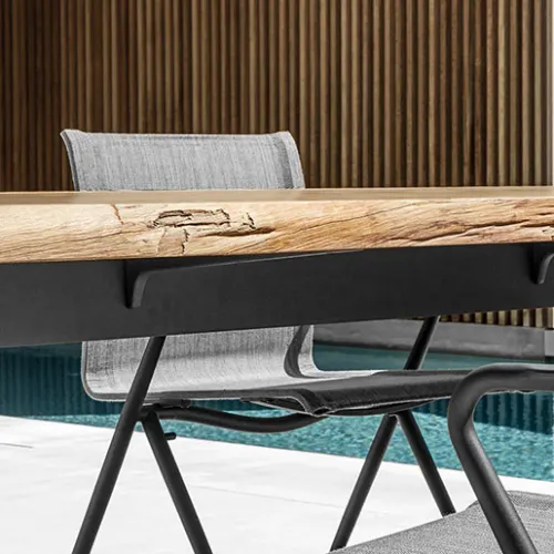 complementary: gloster ryder chairs with raw dining table