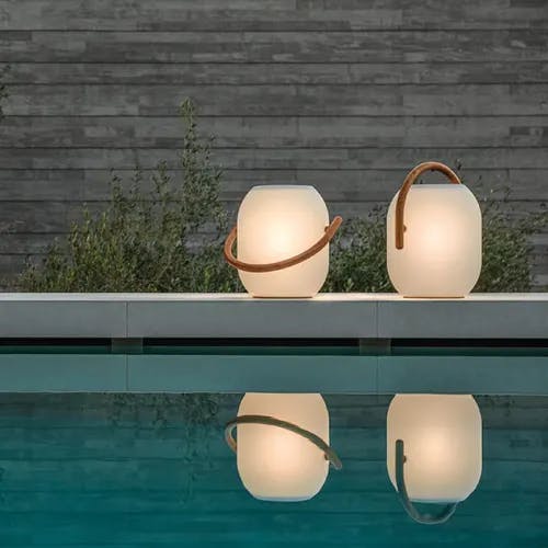 two gloster ambient cocoons next to your poolside