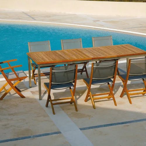 2 horizon folding carver chairs and 6 folding side chairs with barlow tyrie's equinox 59-90" extending dining table