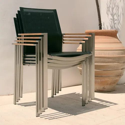 4 stacked mercury armchairs in charcoal textilene