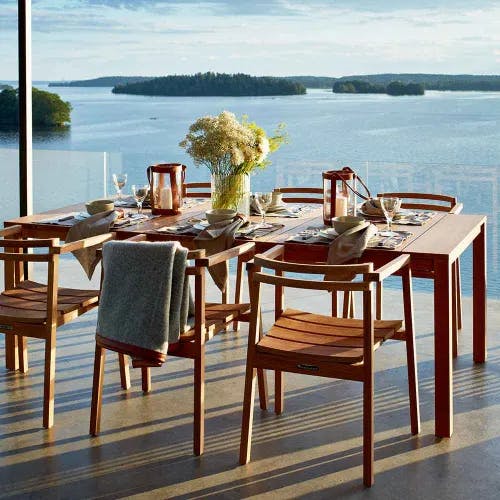 enjoy the view: six oxno armchairs, one skargaarden morup throw paired with oxno 86" dining table (all teak)