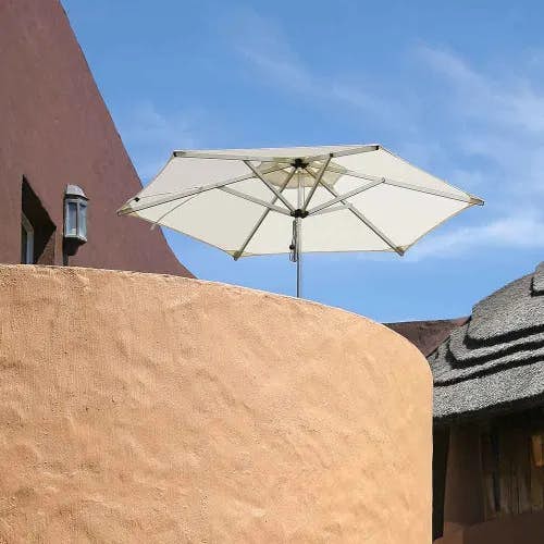 perfect for small decks: swift round center pole umbrella with sunbrella natural canopy
