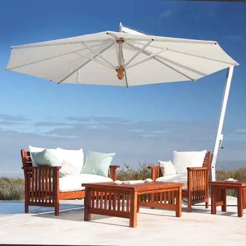 elegant pool setup: pendulum 13.1' round cantilever umbrella with sumbrella canvas canopy
