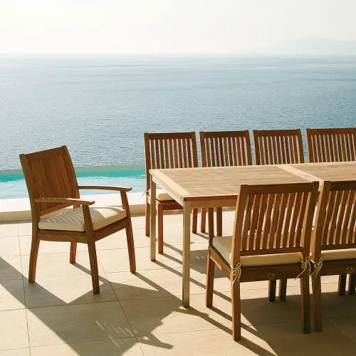 classic dining: monaco armchairs around an equinox 59-90" extending dining table