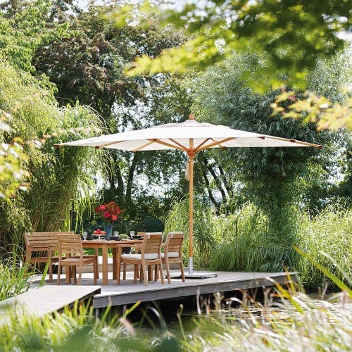ivory canopy: the 9' umbria square parasol combines waterproof ivory campus with sealed hardwood