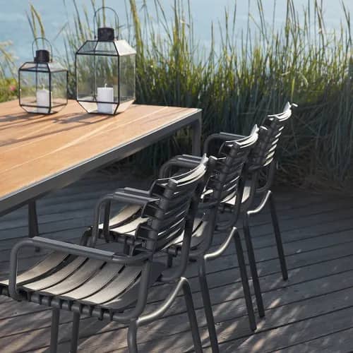 monochrome black dining chairs paired with a bamboo four 83" dining table