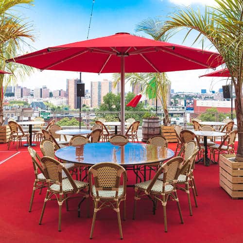 a new standard for shade: octagonal giant patio umbrella in logo red