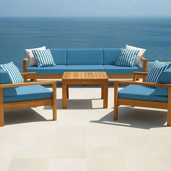 linear 3-seater settee with two linear armchairs surrounding the linear 30" square side table