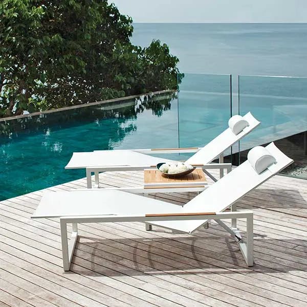 side-by-side serenity: ninix lounger w/ wheels (white w/ teak armrests) and ninix 20" side table (teak)