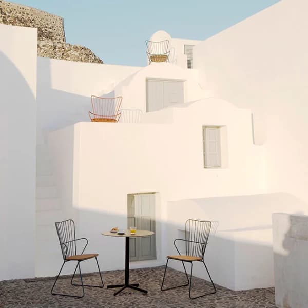 mediterranean flair: paon dining chairs with flor round cafe table