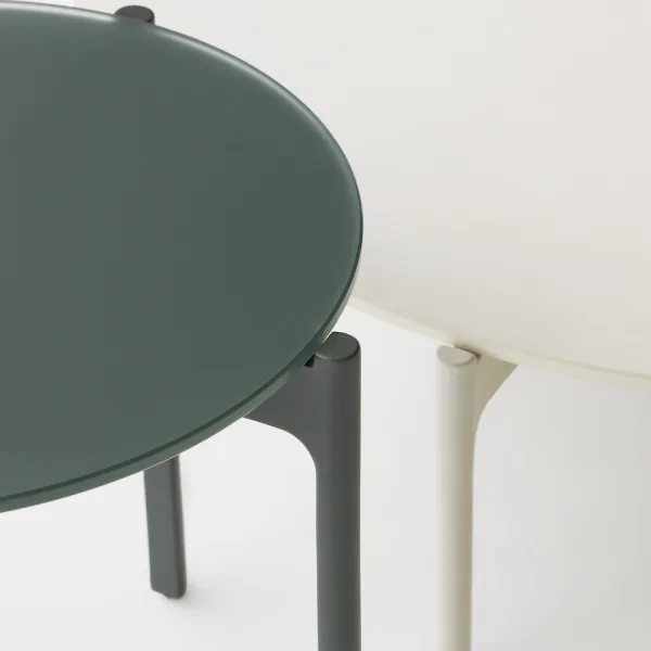 Overlapping Nori Glass Side Table and Lipari/White HPL Coffee Table (Courtesy of DEDON)