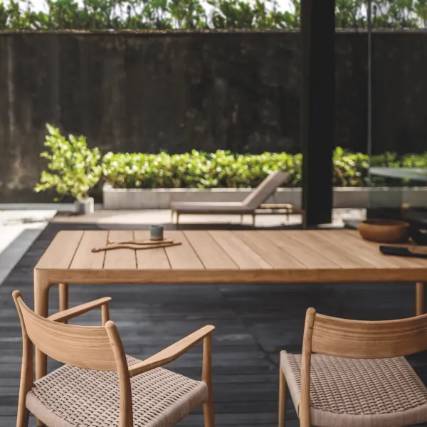 Close-up natural teak backrest and wheat wicker seat panel (Courtesy of Gloster)
