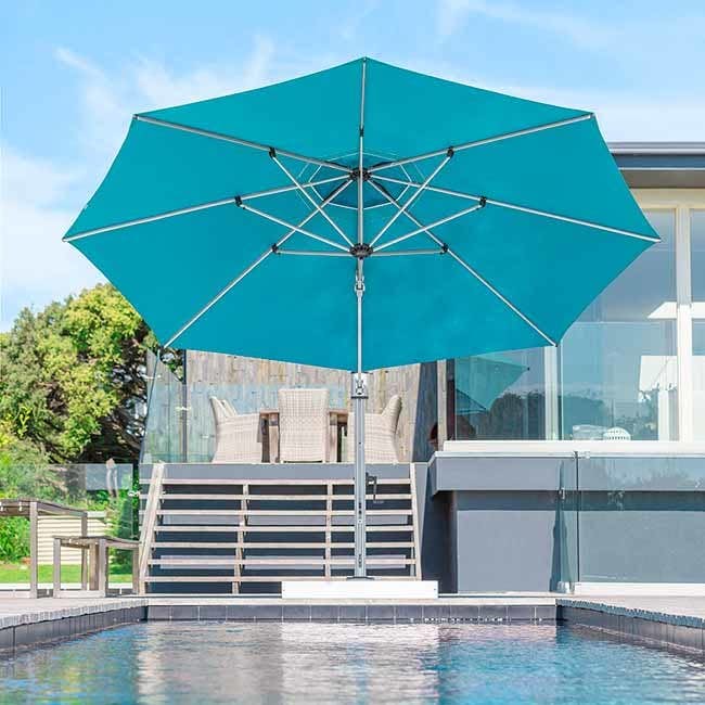 Frankford 13' octagonal Eclipse Cantilever Umbrella in Turquoise Canvas Fabric