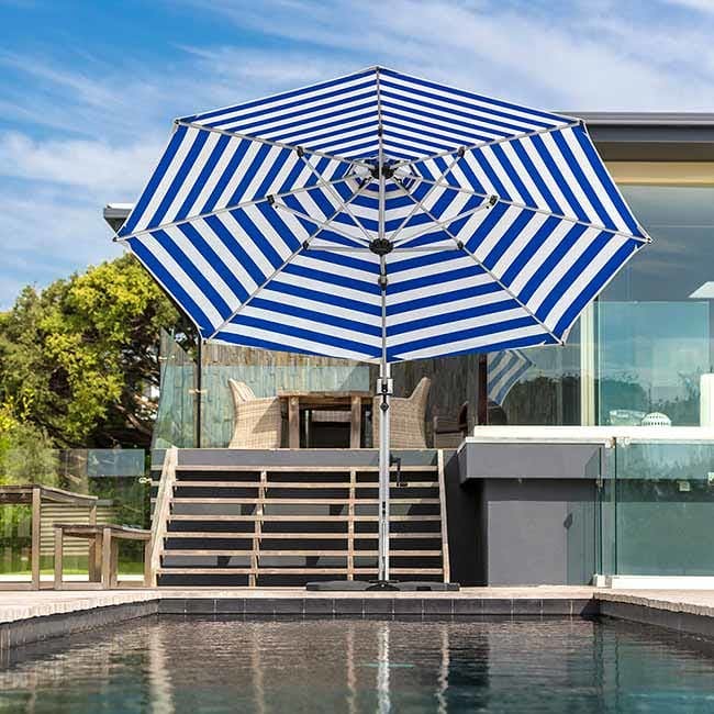 stripes are fun: aurora 11' octagonal premium cantilever pool umbrella in blue stripe
