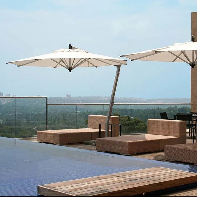 elegant shade solution: 10.5' picollo round cantilever in sunbrella natural canopy
