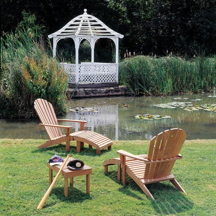 arcadian: two adirondack armchairs with footrest and adirondack 25" side table near the pond