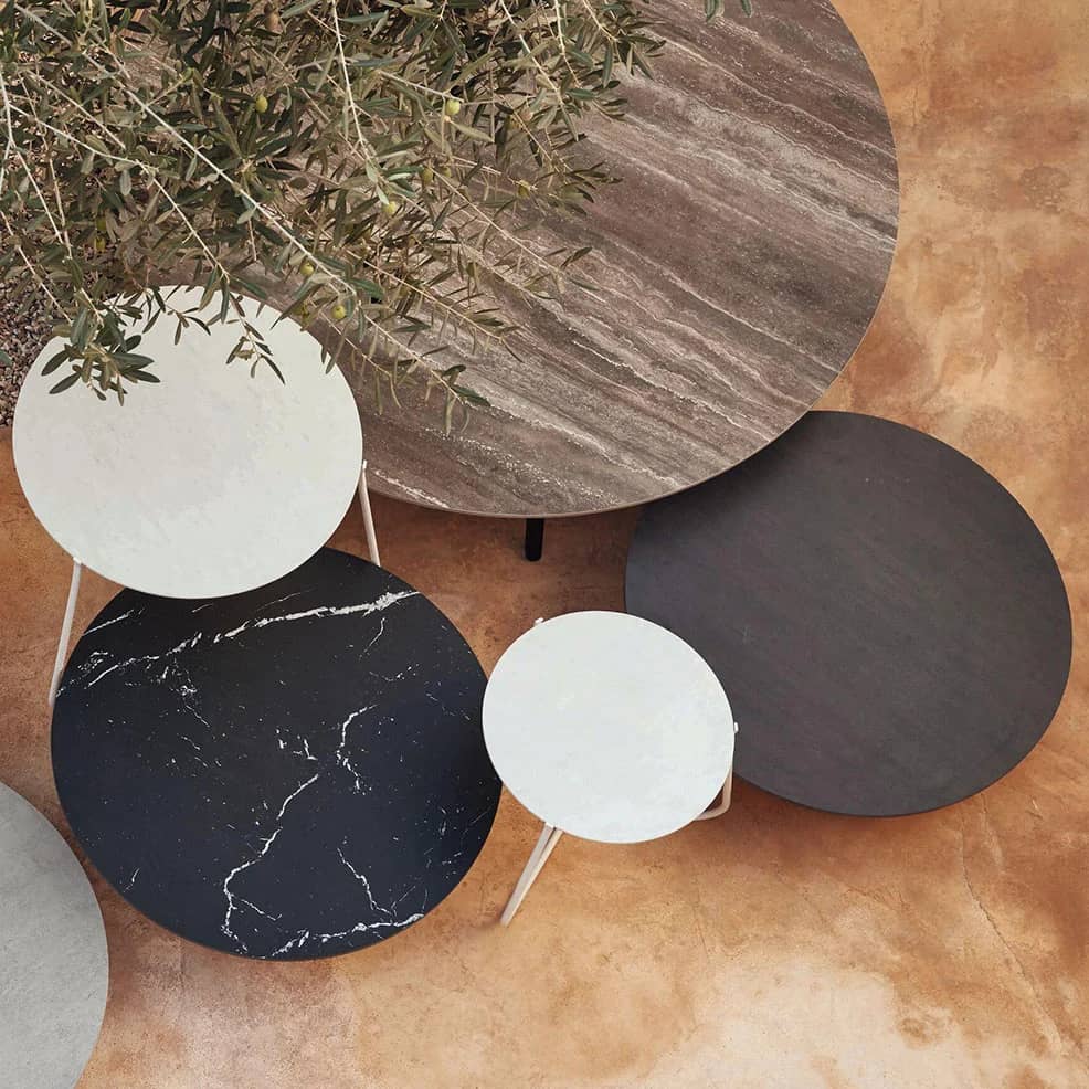 nesting tables: mix and match mood low tables to make a bold statement with different materials