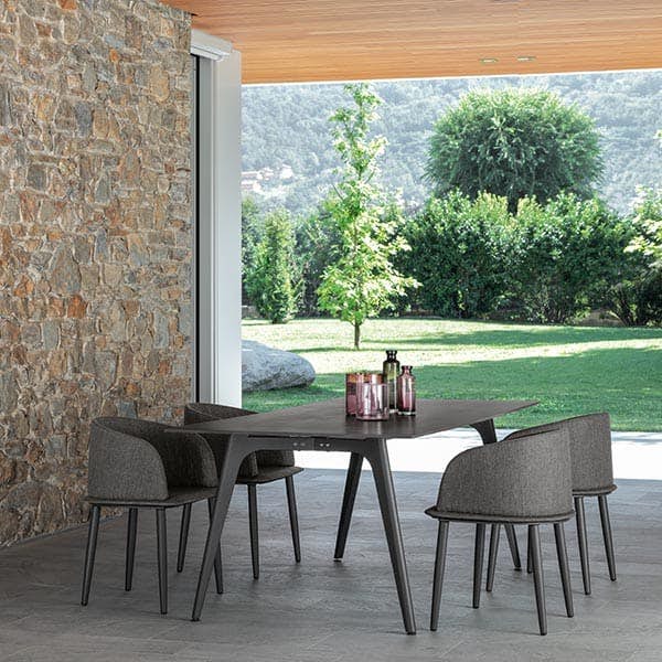 modern outdoor dining: four cleo padded tub chairs with 87" dining table frame graphite