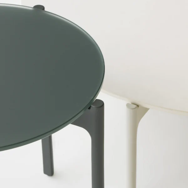 Overlapping Nori Glass Side Table and Lipari/White HPL Coffee Table (Courtesy of DEDON)
