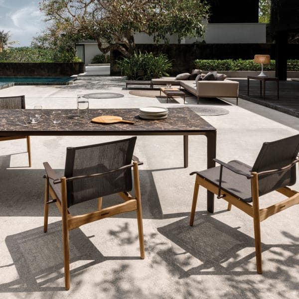 Gloster Carver 87" Dining Table (Java, Emperor) with Stacking Dining Armchair (Java, Sepia)