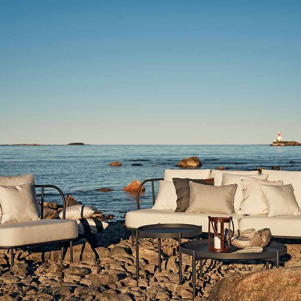 coastal views: salto sofa, lounge chair with lounge tables and skargaarden's marstrand lantern