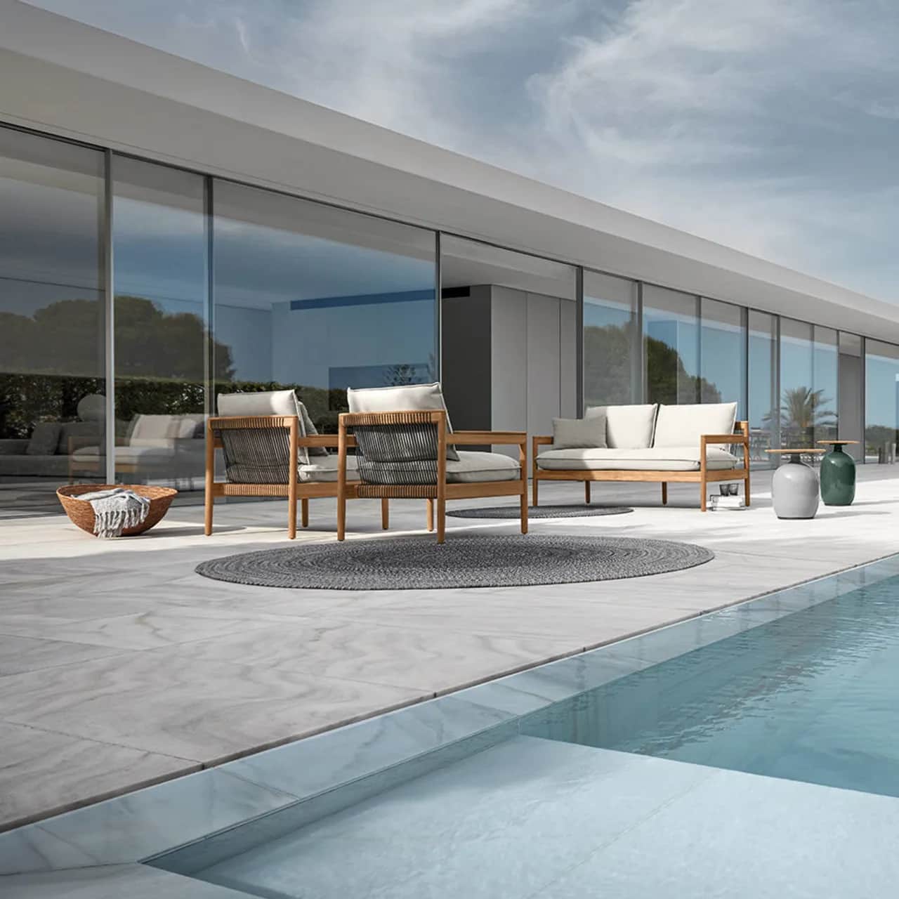 Gloster Saranac Lounge Chairs & 2-Seater Sofa | Blow Side Tables