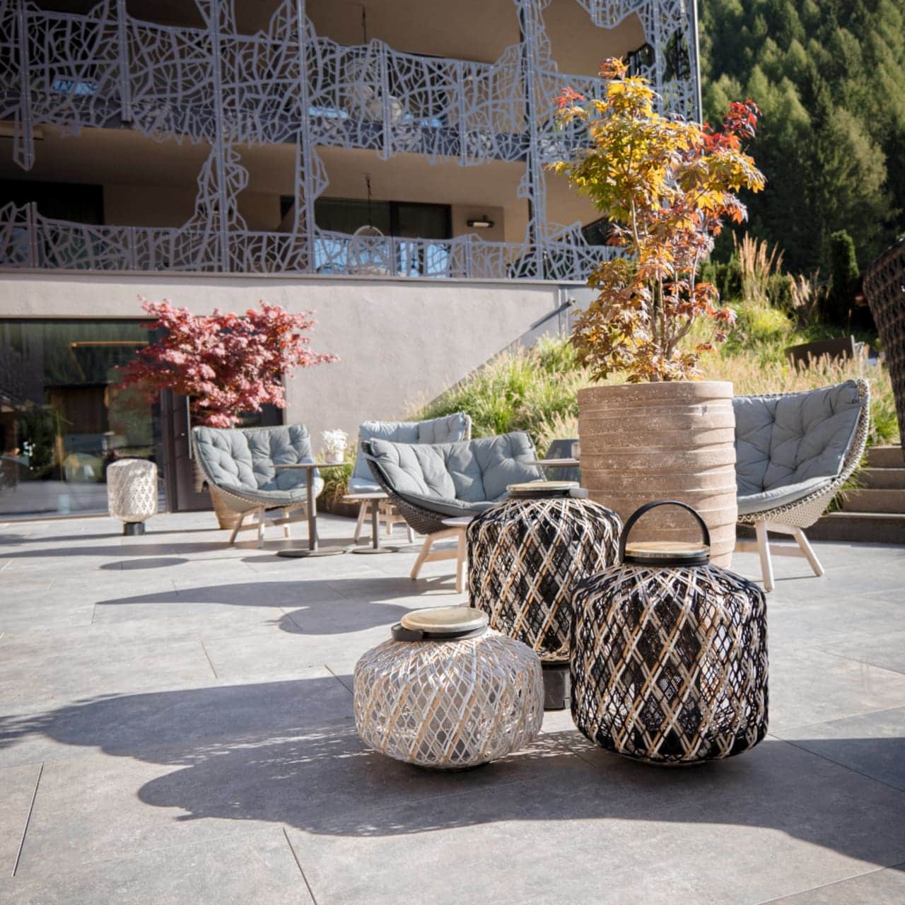 DEDON THE OTHERS Hanging Lanterns | MBRACE Lounge Chairs