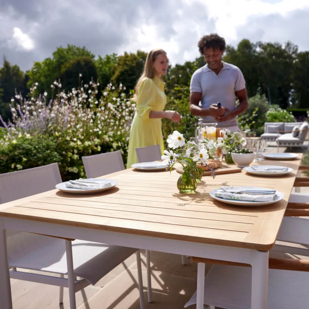 Barlow Tyrie Around 85" Dining Table and Dining Armchair