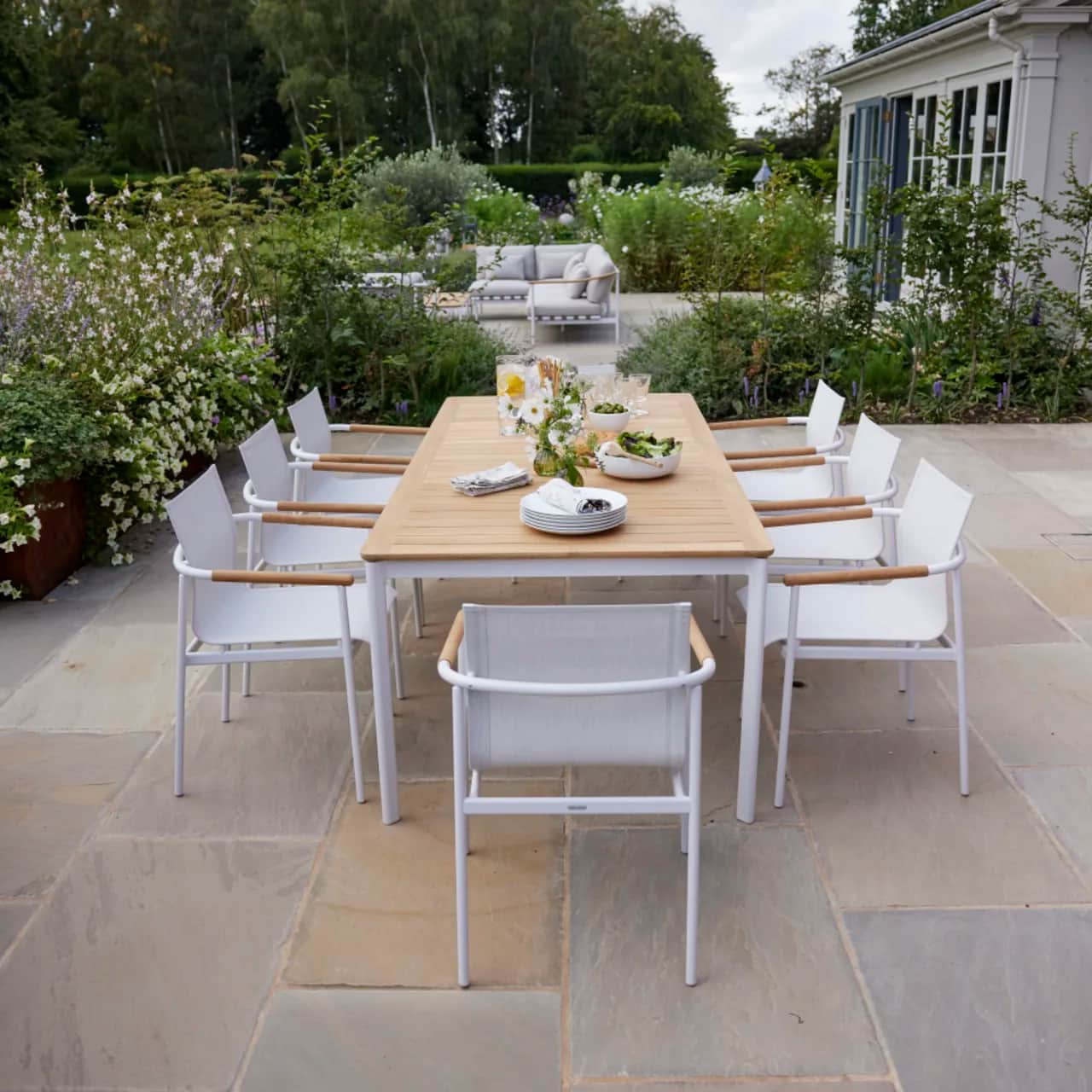 Barlow Tyrie Around 85" Dining Table and Dining Armchair