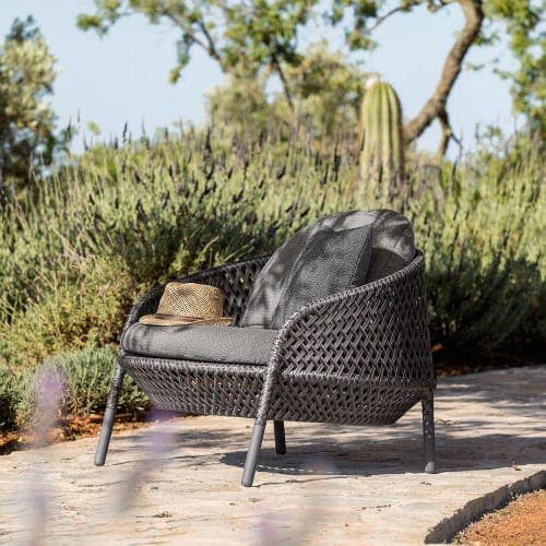Graphite Lounge Chair with Knurled Aluminum Feet (Courtesy of DEDON)