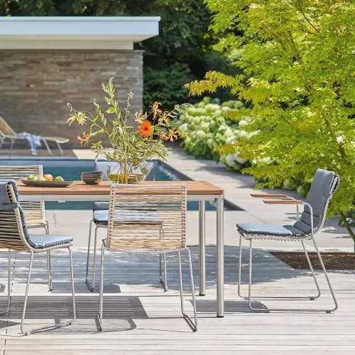 modern outdoor dining: the pan brown chairs stack for easy storage