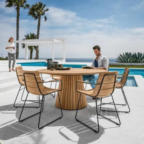 Gloster Whirl 59" Teak Round Table | William Dining Armchairs